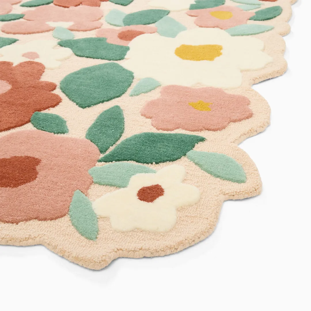 Hand-tufted Terra Bloom Trail Rug with blooming flowers in terracotta, cream, and green shades