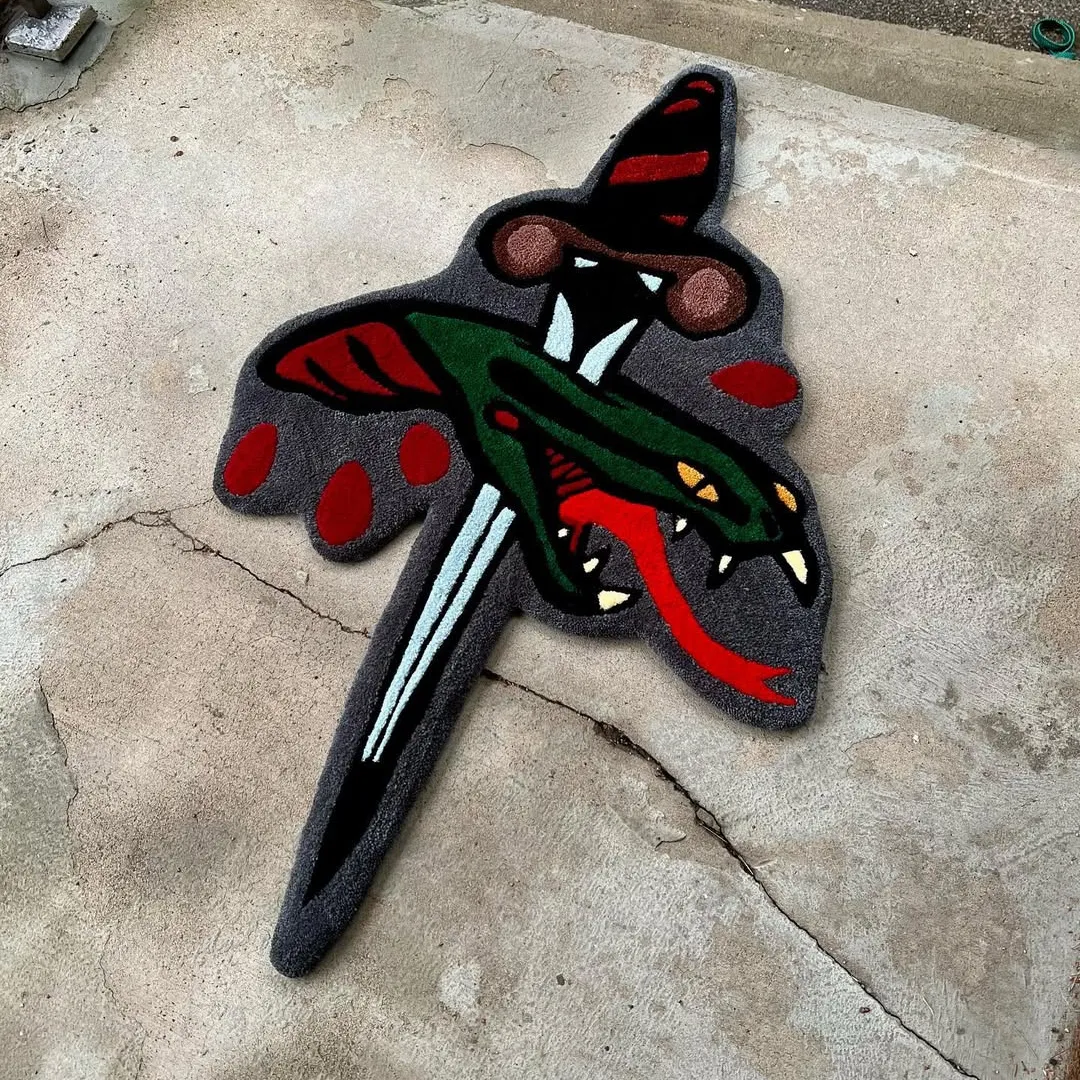 Viper Pierce Rug featuring dagger and snake tattoo design – handmade art rug by Sneagear
