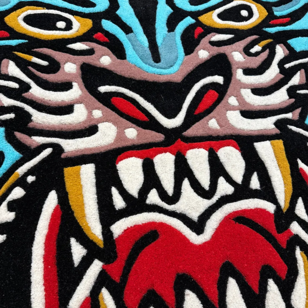 Handmade wool rug shaped like a tiger head with expressive tattoo art – Rebellion Rug