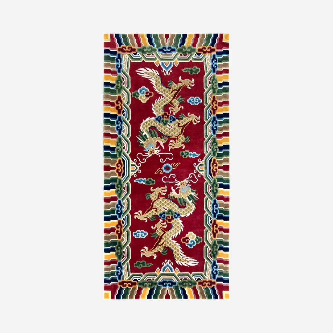 Sacred Triumph Inked Rug Chinese Dragon Design Top down view of the Sacred Triumph Inked rug featuring golden dragons on a deep crimson red background surrounded by traditional Tibetan cloud borders.