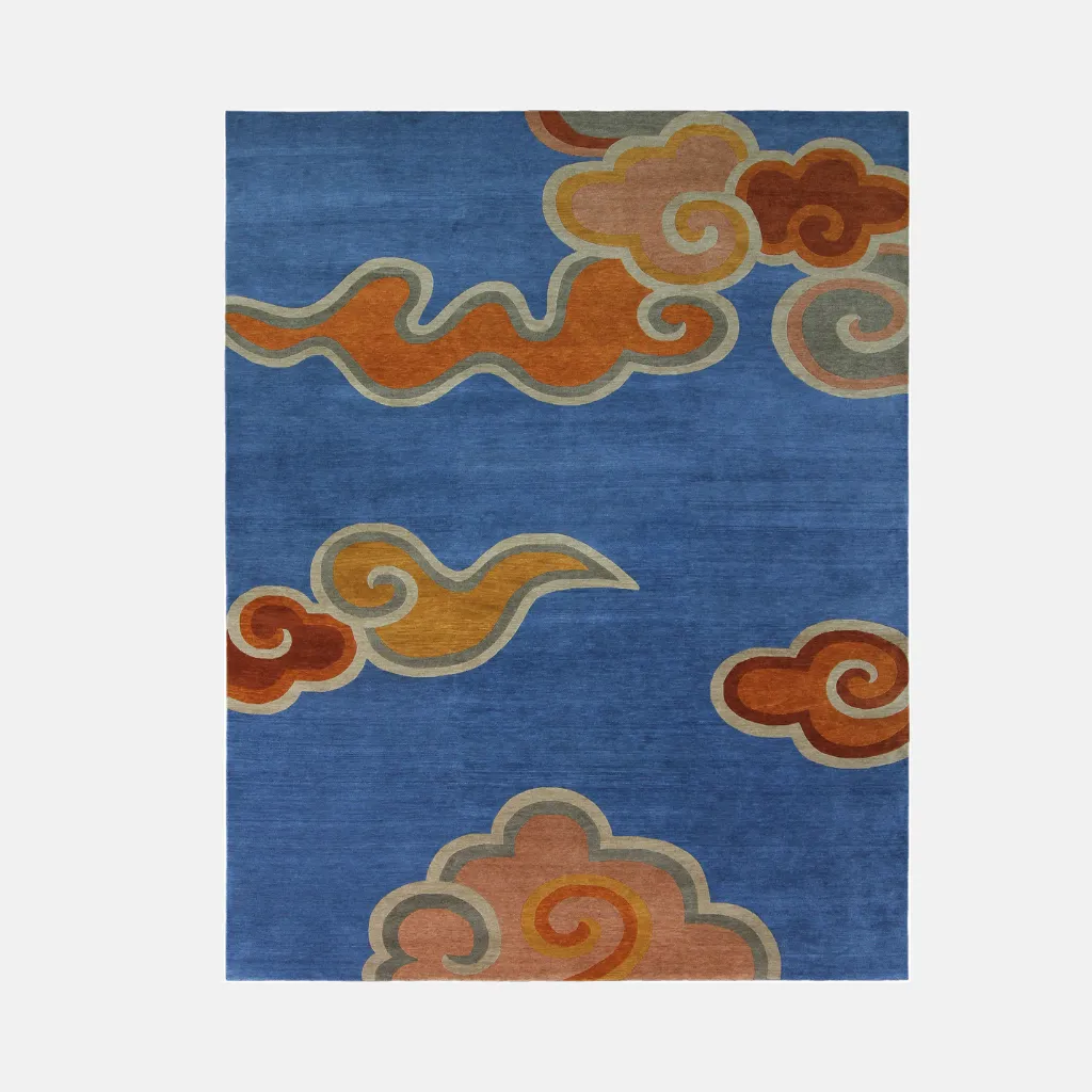 Top down view of the Skybound Weave rug featuring a floating cloud design in earthy tones against a solid azure blue background.