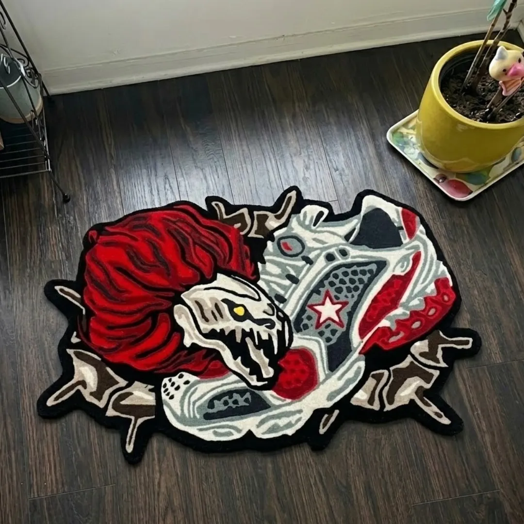 crimson talon break rug top view Crimson Talon Break custom tufted area rug displayed flat on a dark wooden floor.