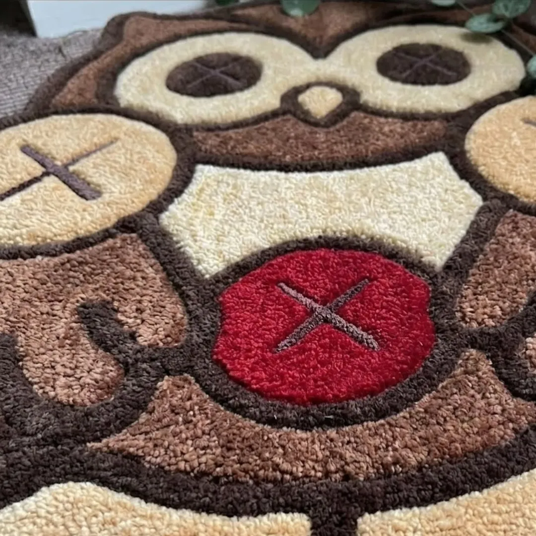 Close-up of the detailed tufted pile texture, X-mark accents, and rich color blocking on the Pop Phantom rug.