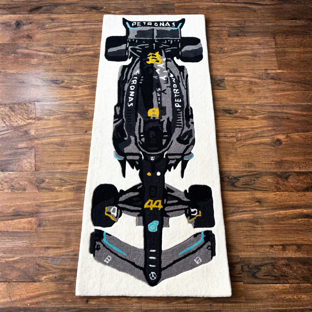 Top down view of the Scarlet Pulse runner rug featuring a detailed illustration of a black and silver Formula 1 race car with the number 44 and teal accents.