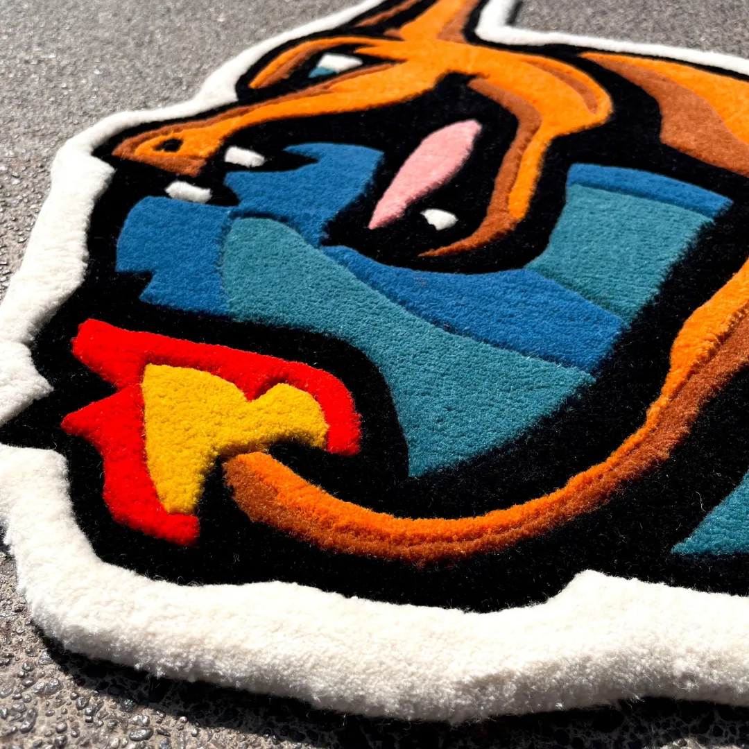 Angled view of the Volcanic Roar rug on a tiled floor, showing the unique die-cut shape of a roaring red dragon head with vibrant orange and yellow fire details.