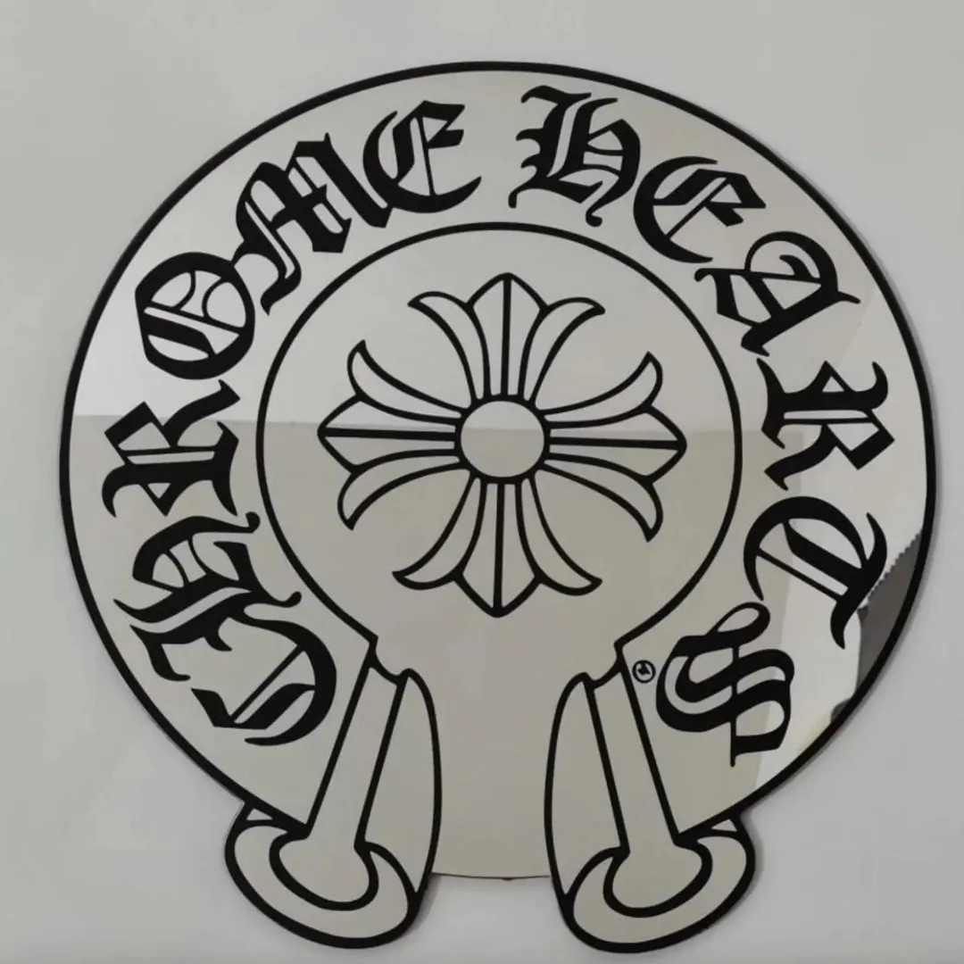 Decorative gothic cross mirror with black outline and old English text minimal clean display