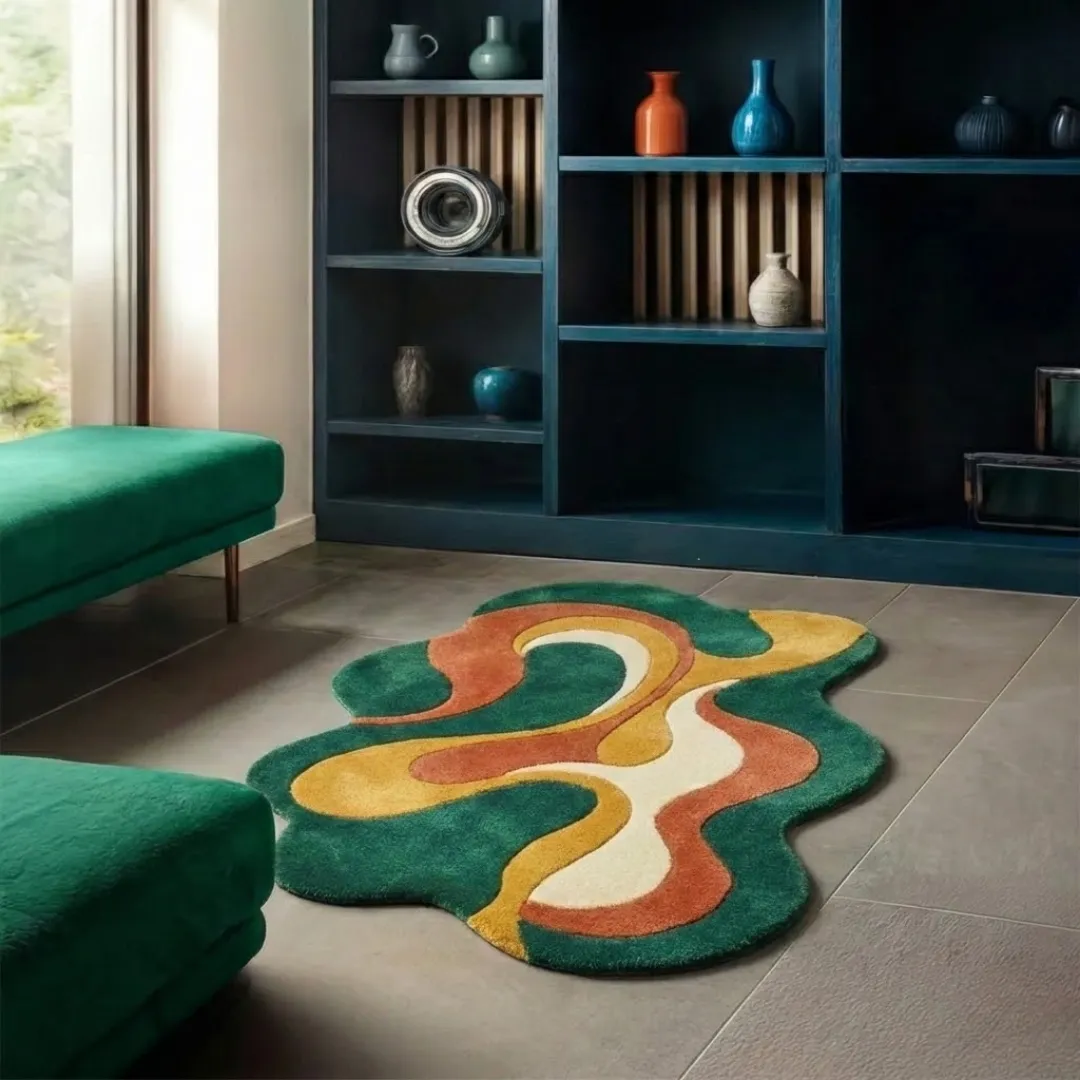 Perspective lifestyle view of the Viral Wave rug placed on a grey tile floor in a modern room, styled with green velvet benches to highlight the vibrant, multi-colored wavy design and dense wool texture.