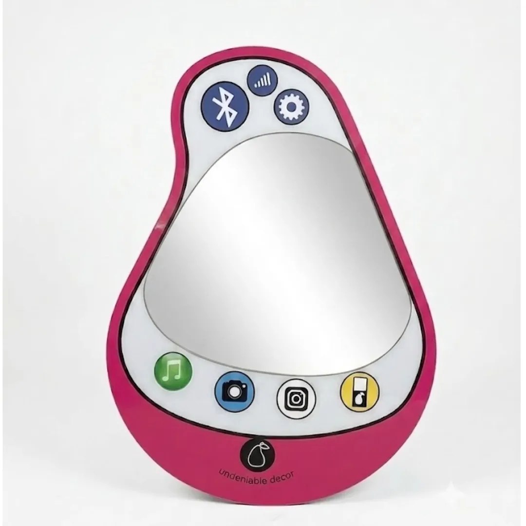 Product studio shot of the Aura Pear Phone Mirror isolated on a plain white background, featuring a hot pink pear-shaped border, retro smartphone app icons, and a glossy glass mirror surface.