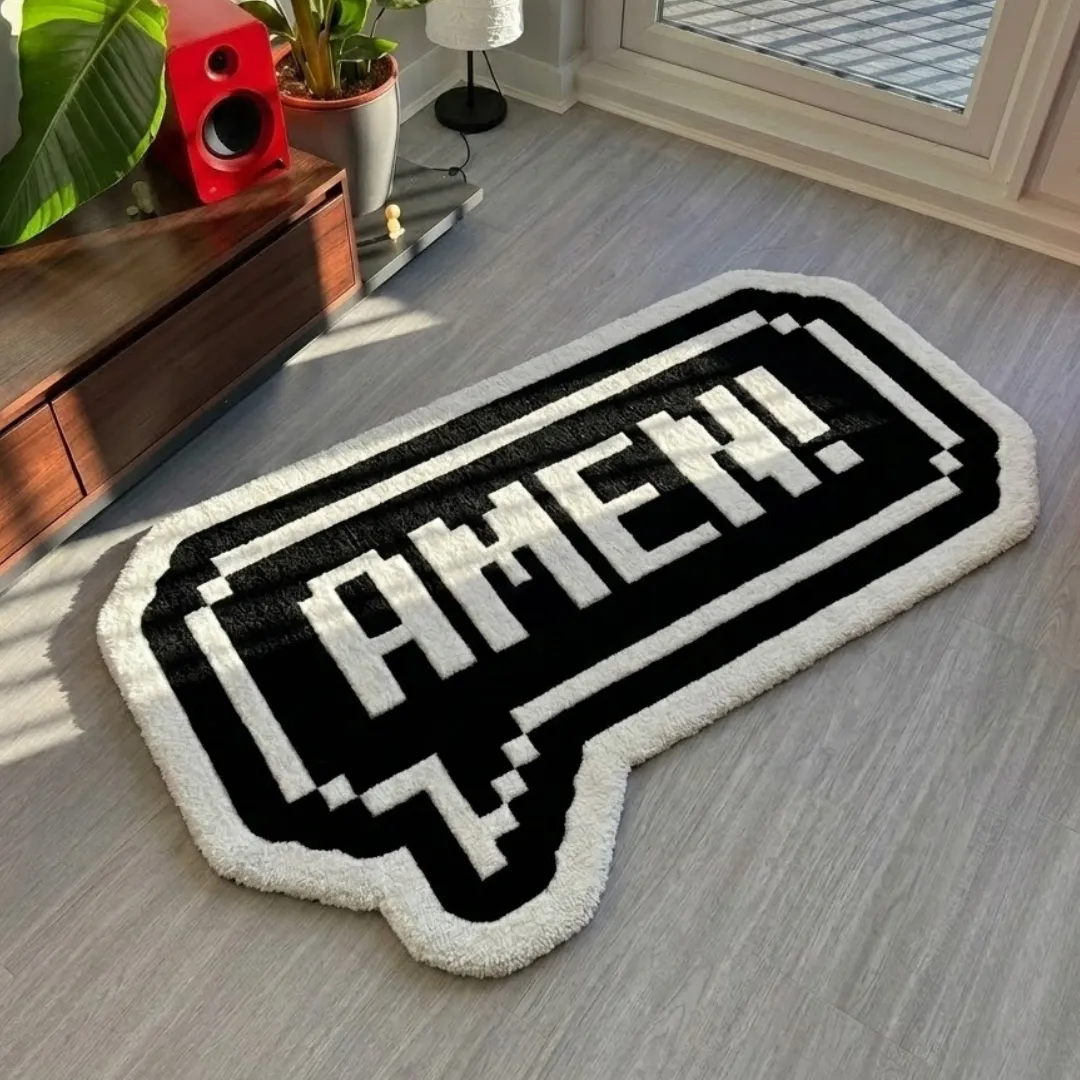 amen rug living room mockup Amen handmade tufted area rug featuring a black and white pixelated speech bubble design with the word "AMEN!" styled on a light wood floor.
