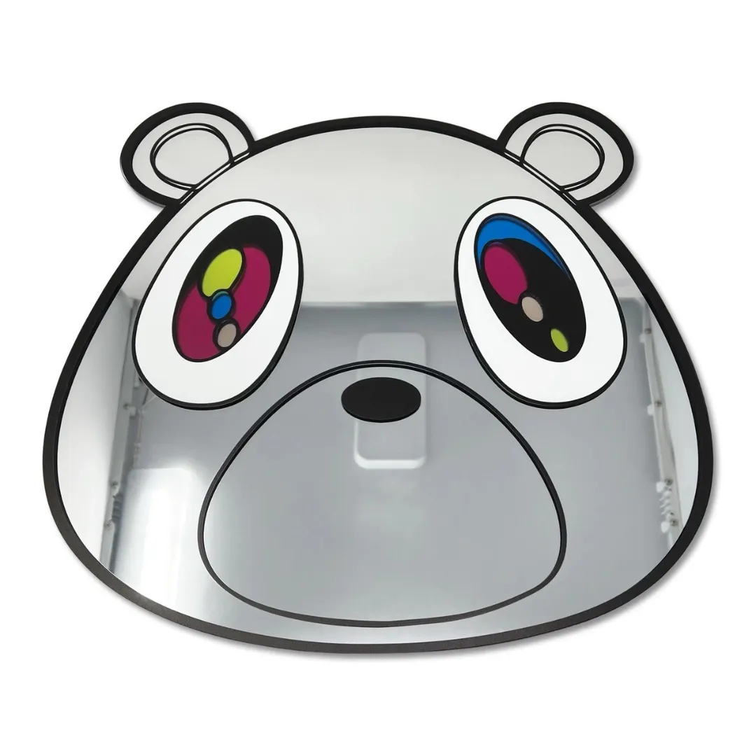 bear dropout rug top view Bear Dropout shaped decorative wall mirror featuring a cartoon bear head with colorful graphic eyes, displayed flat on a white background.