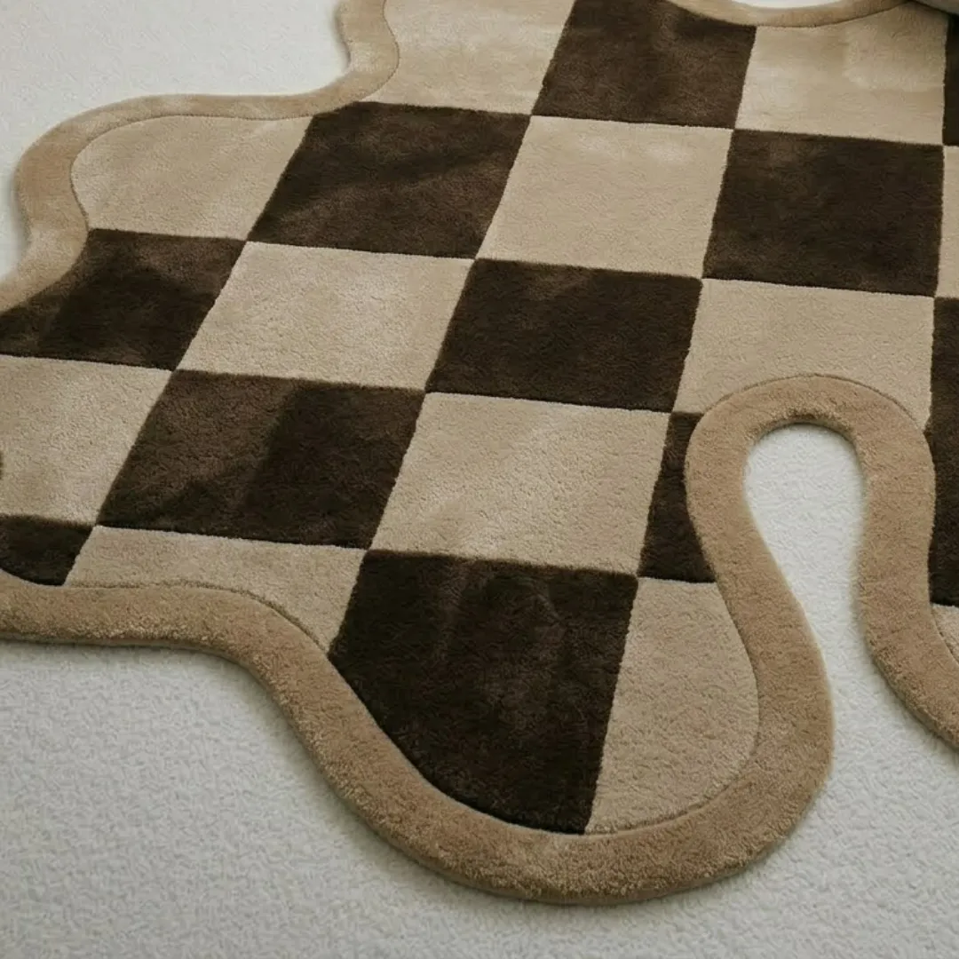 checkered flow rug close up texture Close-up of the plush tufted pile texture, clean brown and beige checkerboard squares, and sculpted borders on the Checkered Flow rug.