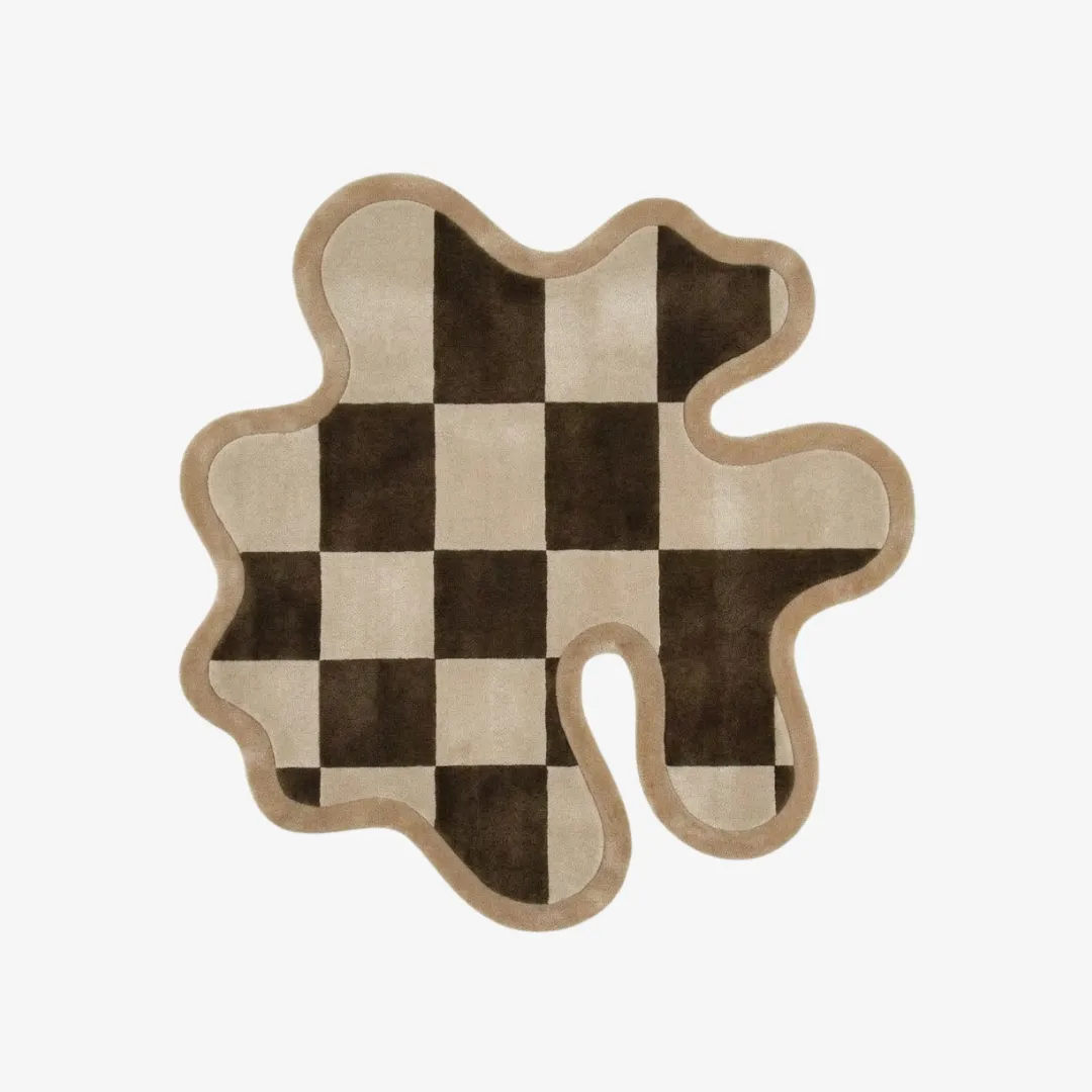 checkered flow rug top view Checkered Flow organic irregular-shaped tufted area rug featuring a brown and beige checkerboard pattern with sculpted borders, displayed flat.