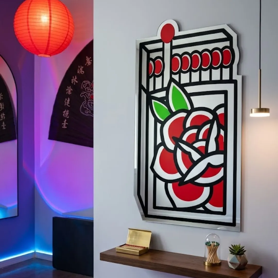 Cherry Blossom designer matchbox wall mirror styled in a modern room with ambient lighting, a floating wooden shelf, and a red paper lantern.