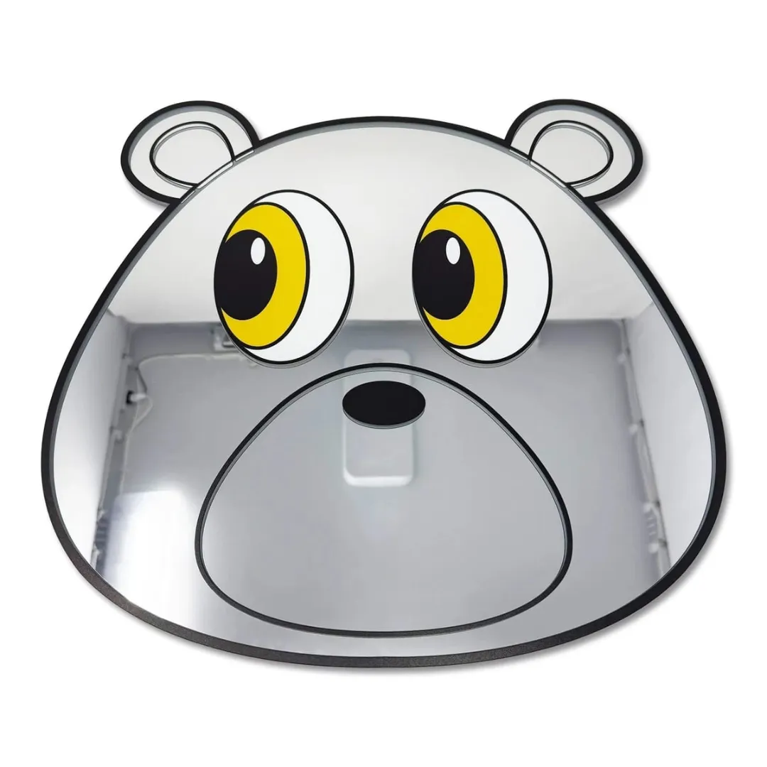 Dropout Bear shaped decorative wall mirror featuring a cartoon bear head with yellow and black graphic eyes, displayed flat on a white background.