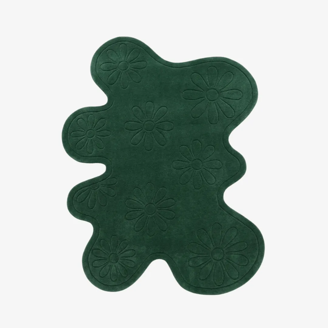 fern valley rug top view Fern Valley green organic irregular-shaped tufted area rug featuring carved daisy flower motifs, displayed flat.