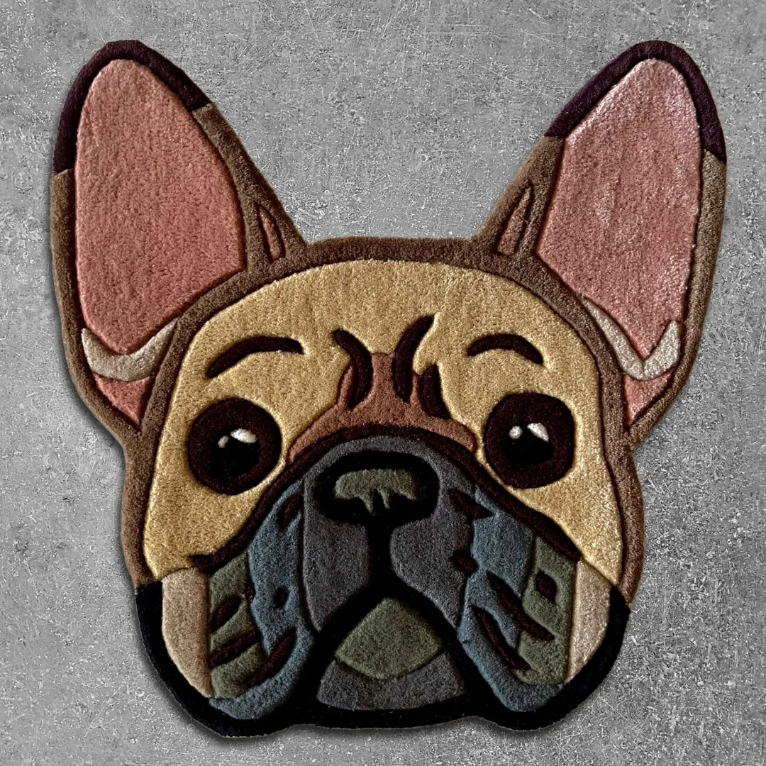 French Bulldog handmade tufted area rug featuring a playful shaggy dog face with black, tan, grey, and pink accents, displayed flat.
