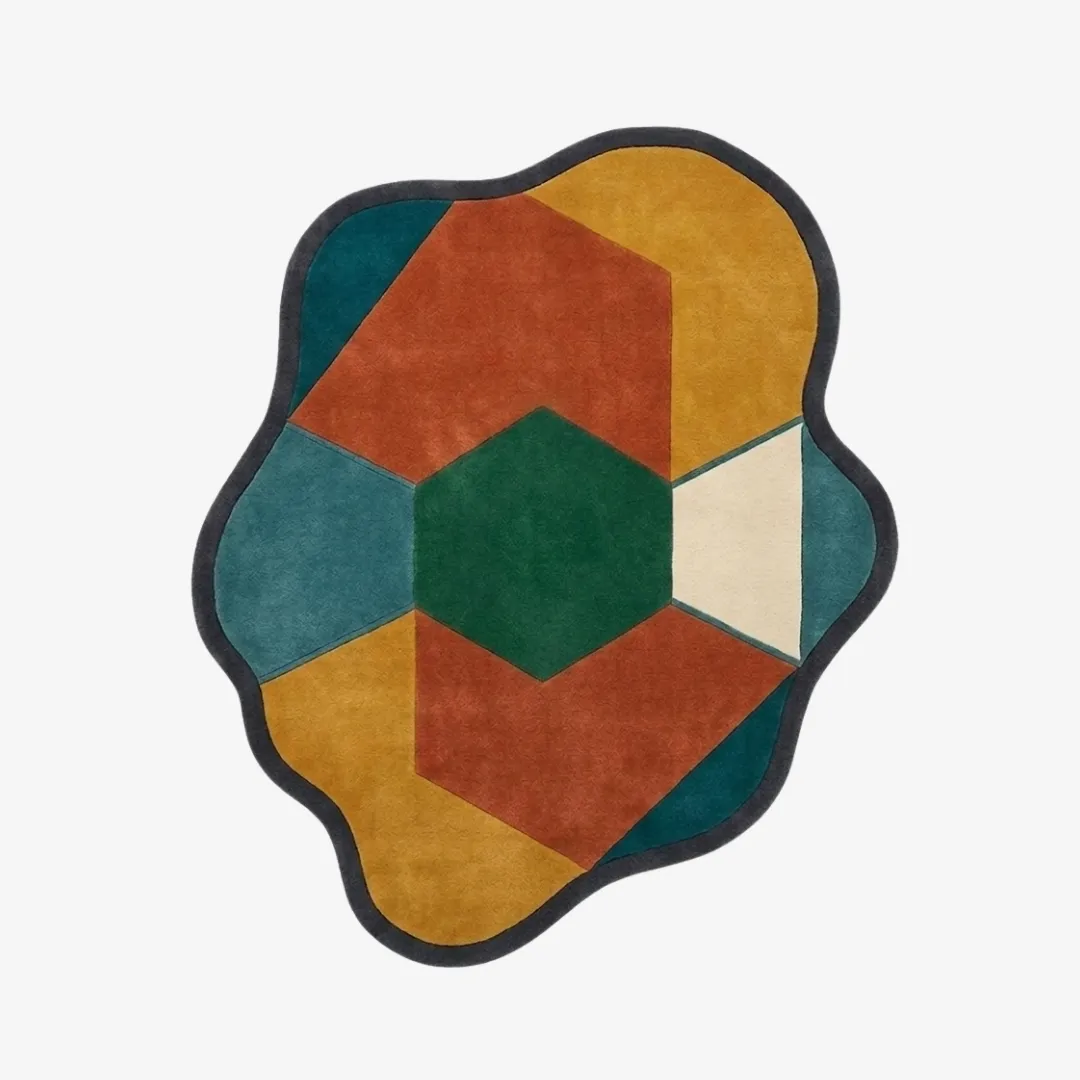 geo harmony rug top view Geo Harmony organic irregular-shaped tufted area rug featuring a geometric color-block pattern in mustard, rust, green, and teal, displayed flat.