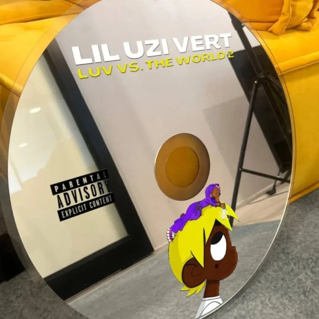 Uzi Disc decorative CD-shaped wall mirror featuring Lil Uzi Vert Luv Vs. The World 2 album artwork and graphics, angled near a bright yellow sofa.