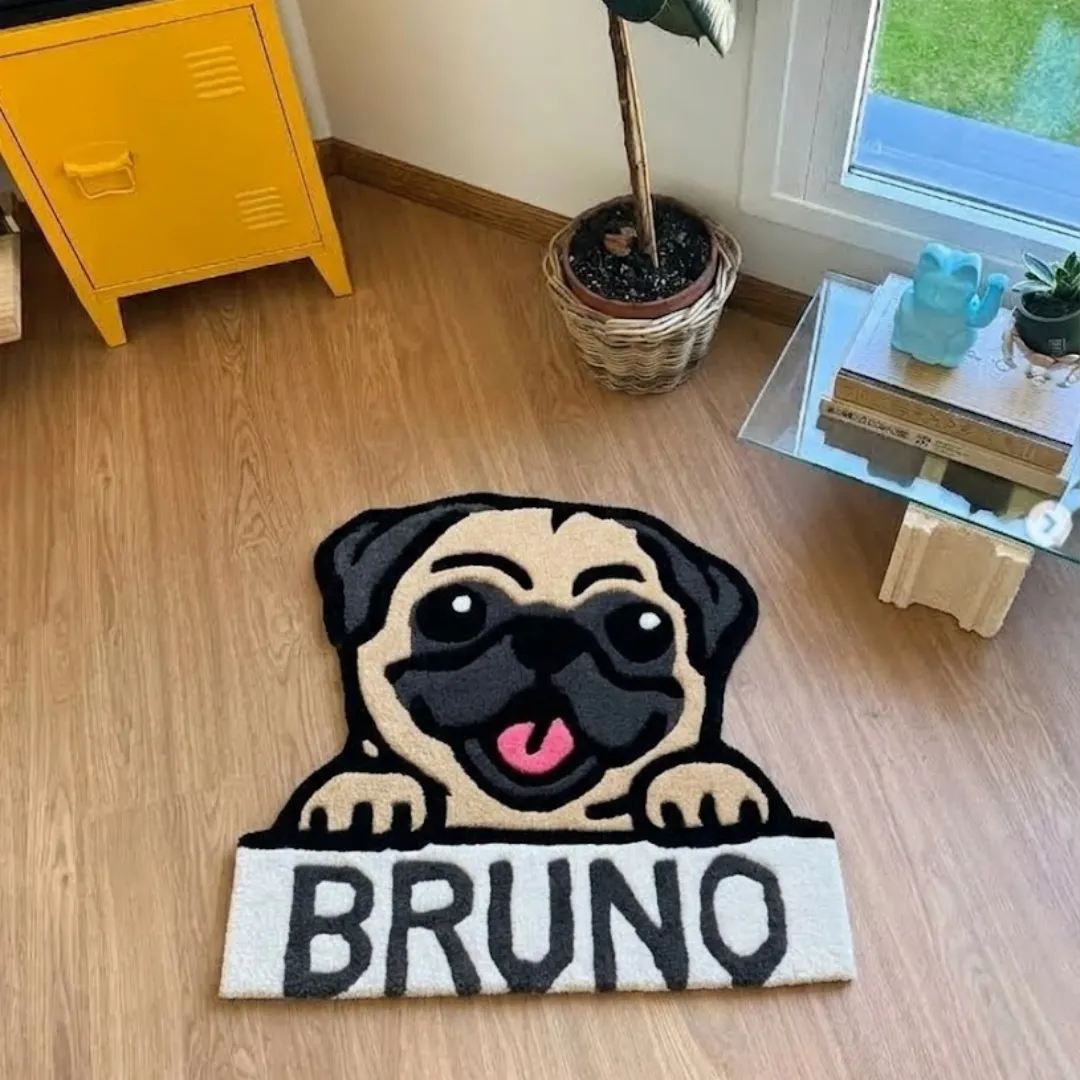 bruno pug rug overhead room view Bruno Pug handmade tufted novelty area rug shaped like a cute pug looking over a sign with the name "BRUNO", displayed flat on a wooden floor in a sunny room.