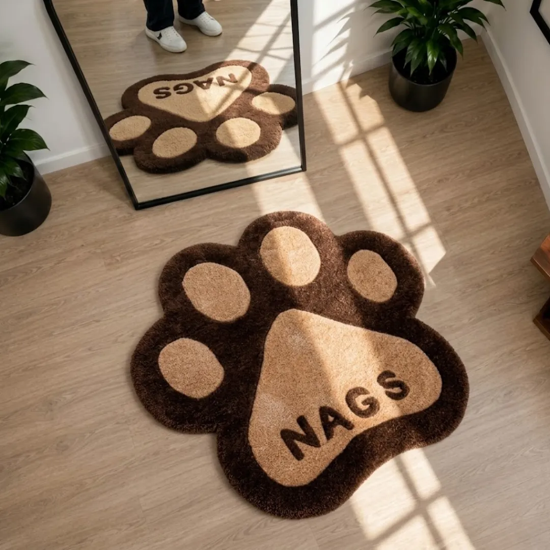 cocoa paw rug floor mirror view Cocoa Paw designer tufted rug laid out in a bright room with potted plants and minimalist interior decor.