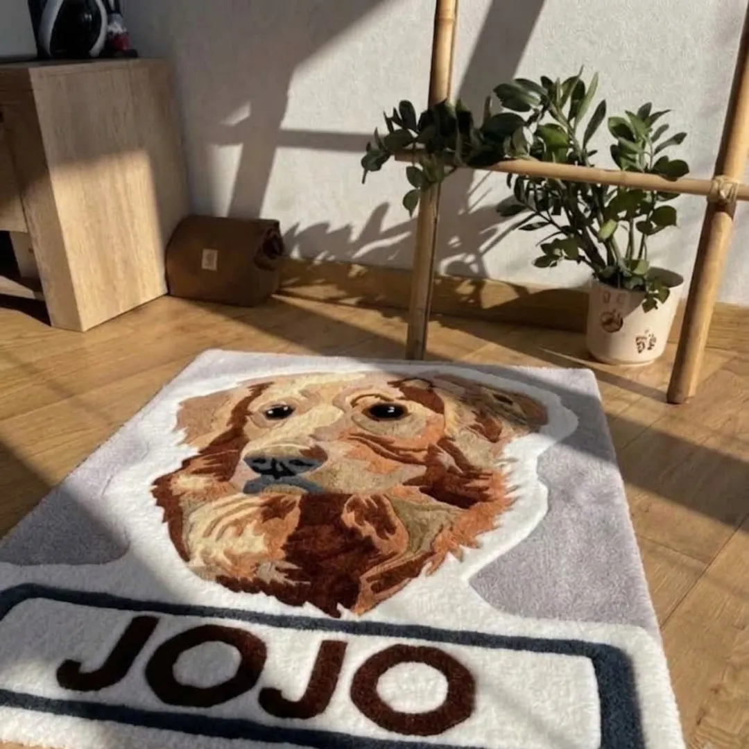 Angle view of the Jojo Golden tufted novelty rug showcasing its custom golden retriever design and plush wool construction on a hardwood floor.