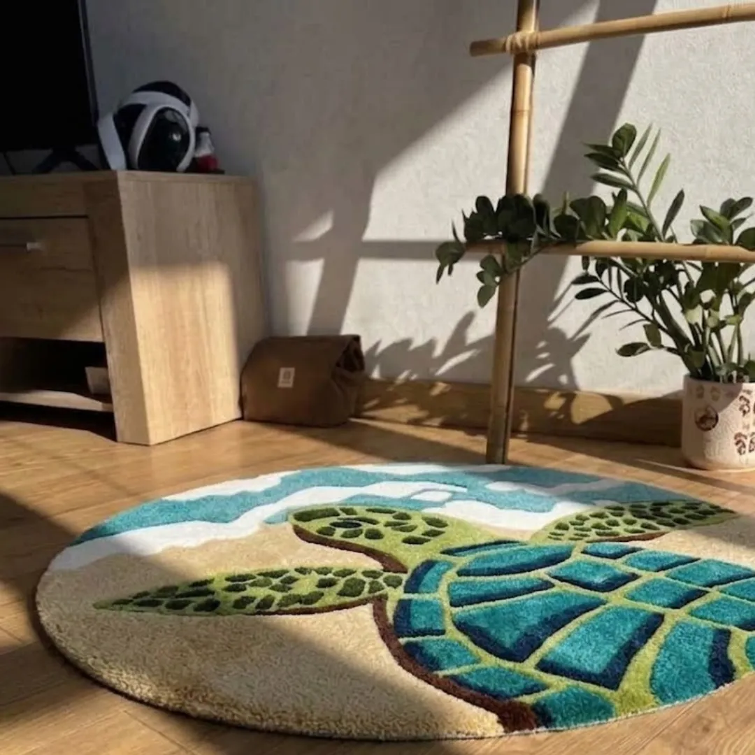 tide shell rug angle interior view Angle view of the Tide Shell tufted circular rug showcasing its ocean-inspired sea turtle pattern and plush wool construction in a sunlit room.